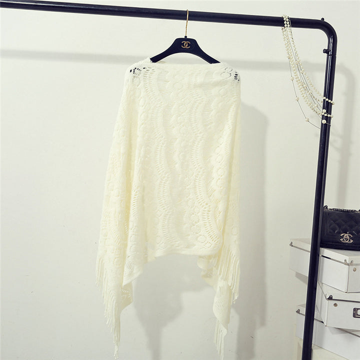 Damen Strickponcho mit fransigen Details und luftiger Lochstruktur Drune