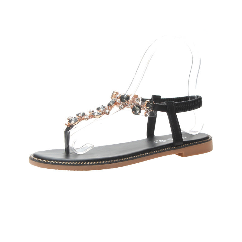 Damen nan flache T-Riemen-Sandalette mit funkelnder Schmuckkette, elastischem Fersenband und gepolstertem Fußbett Drune