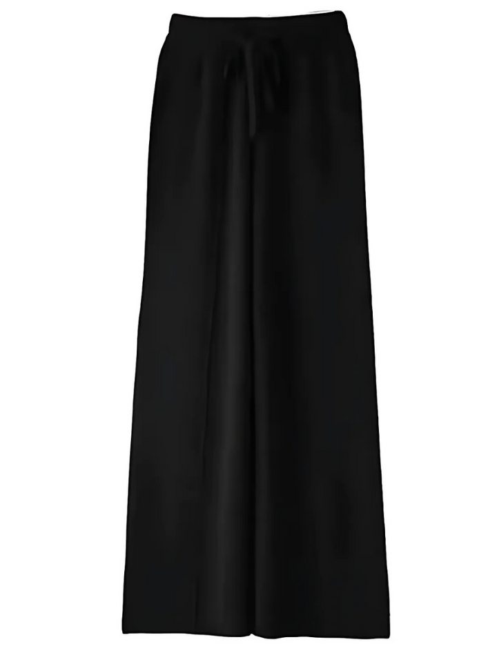 Drune | DIE STRICKHOSE MIT WEITEM BEIN FÜR STILVOLLE GEMÜTLICHKEIT