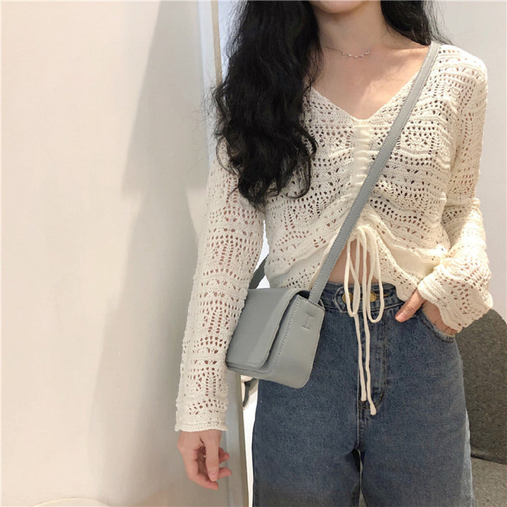 Damen Strickbluse mit dekorativem Lochmuster und verstellbarem Kordelzug Drune