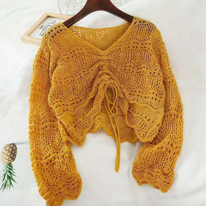 Damen Strickbluse mit dekorativem Lochmuster und verstellbarem Kordelzug Drune