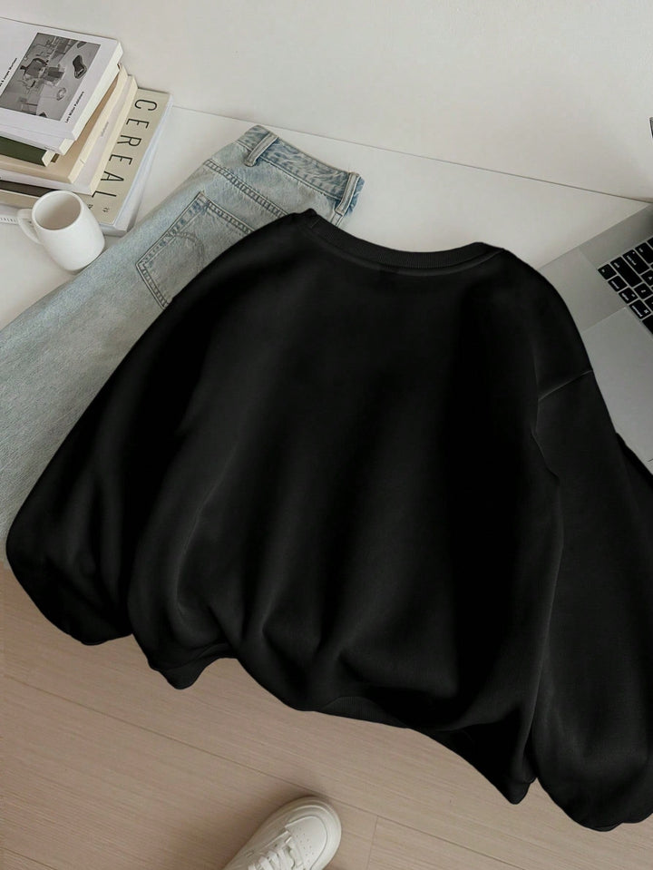 Drune | Lässiges Leopard- und Kirschgrafik-Sweatshirt in Schwarz