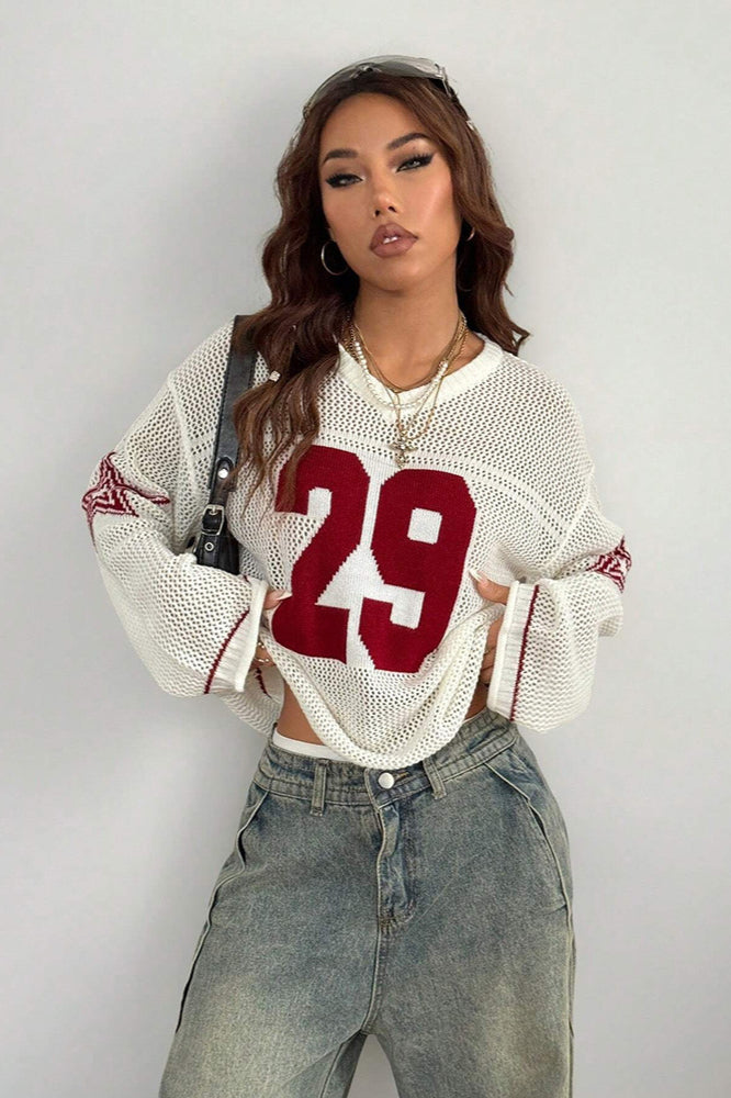 Drune | Cozy V-neck knit sweater with digital print