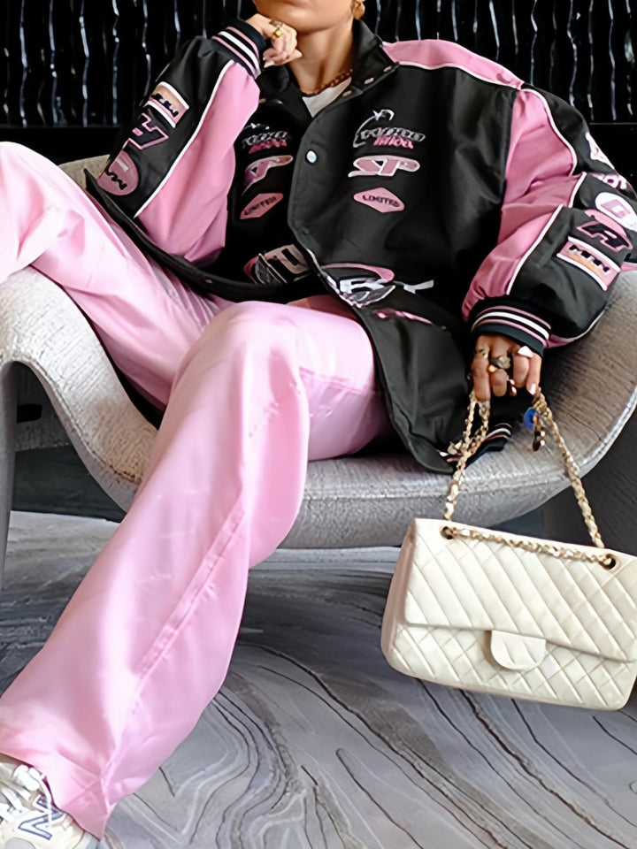 Drune | Schwarze Pink Raglan-Motojacke mit bedrucktem Slogan