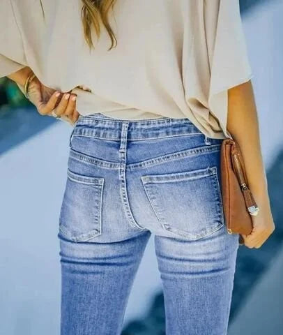 Drune | High-Waist Schlagjeans für Damen mit Knopfleiste, figurbetontem Schnitt und ausgestelltem Bein für einen Retro-Style