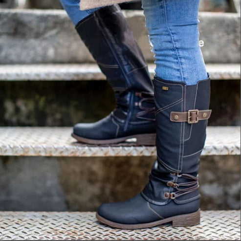Damen nan wadenhohe Stiefel in Lederoptik mit verstellbaren Zierriemen und profilierter Gummisohle Drune