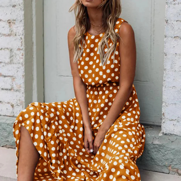 Drune | Schwarzes Polka Dot Midikleid Für Einen Retro Chic Look