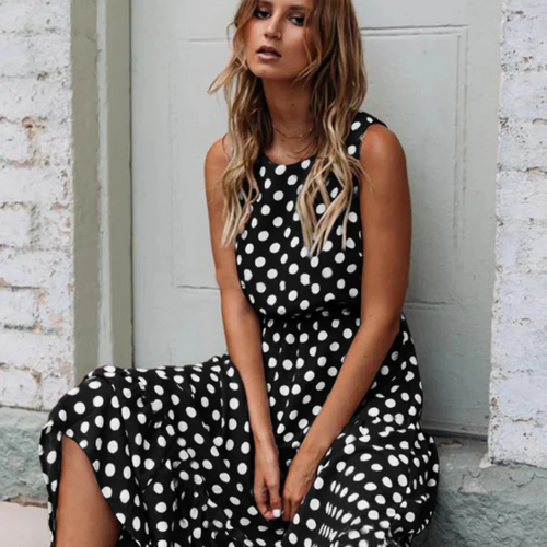 Drune | Schwarzes Polka Dot Midikleid Für Einen Retro Chic Look