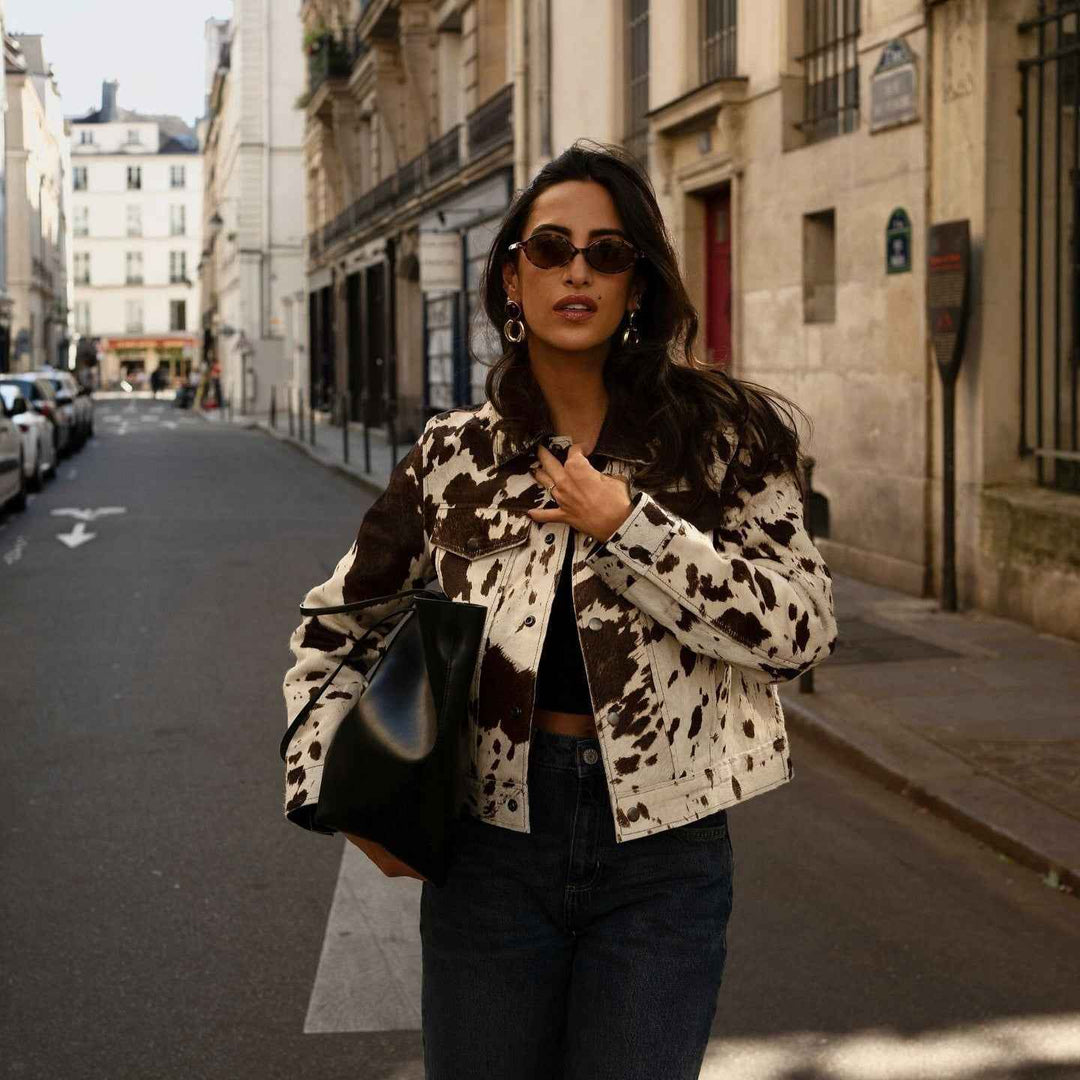 Drune | Jacket with cow print, lapel collar and stylish snap buttons