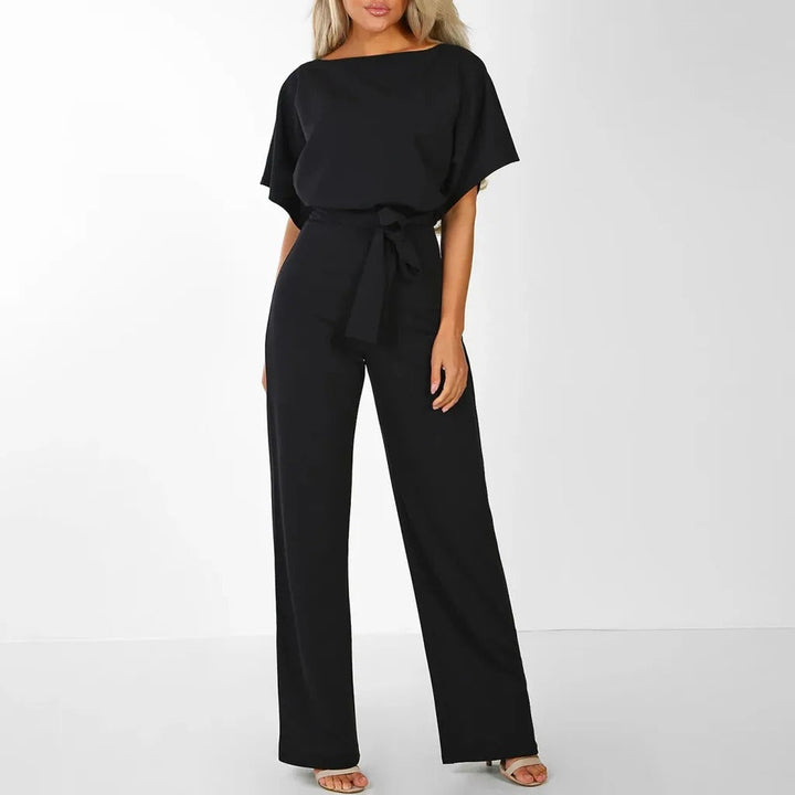 Drune | Eleganter Jumpsuit mit Rüschärmeln und Gürtel