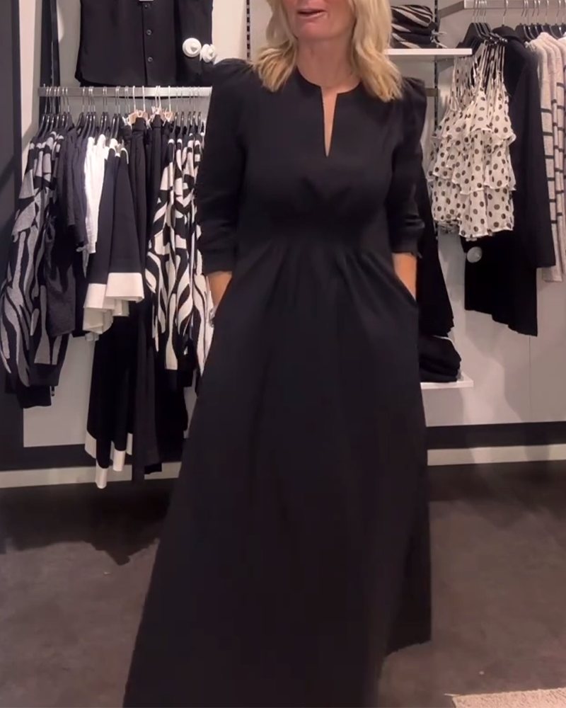 Drune | Linien Kleid mit Puffärmeln und Tailliertem Schnitt