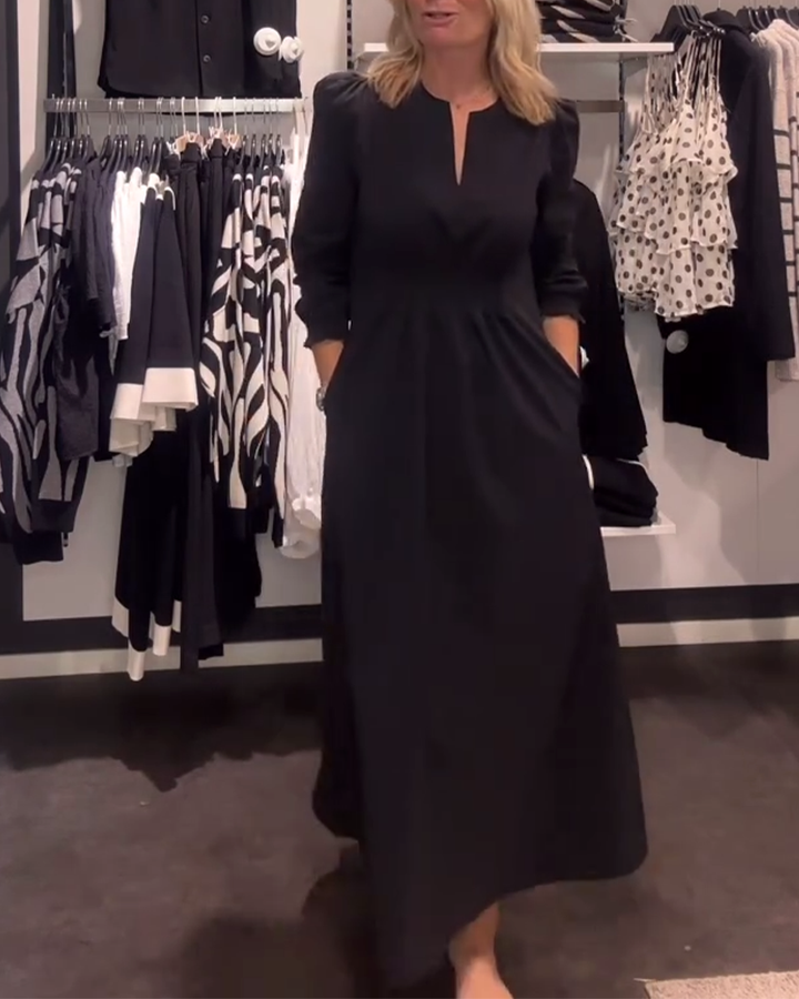 Drune | Linien Kleid mit Puffärmeln und Tailliertem Schnitt