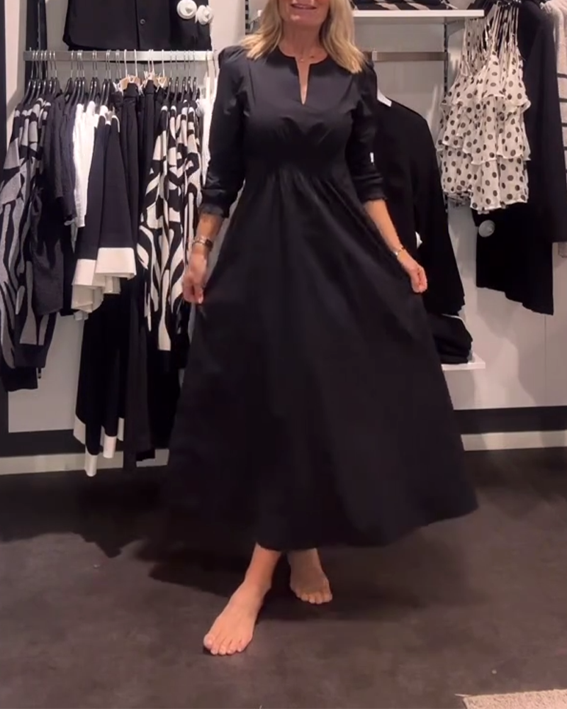 Drune | Linien Kleid mit Puffärmeln und Tailliertem Schnitt