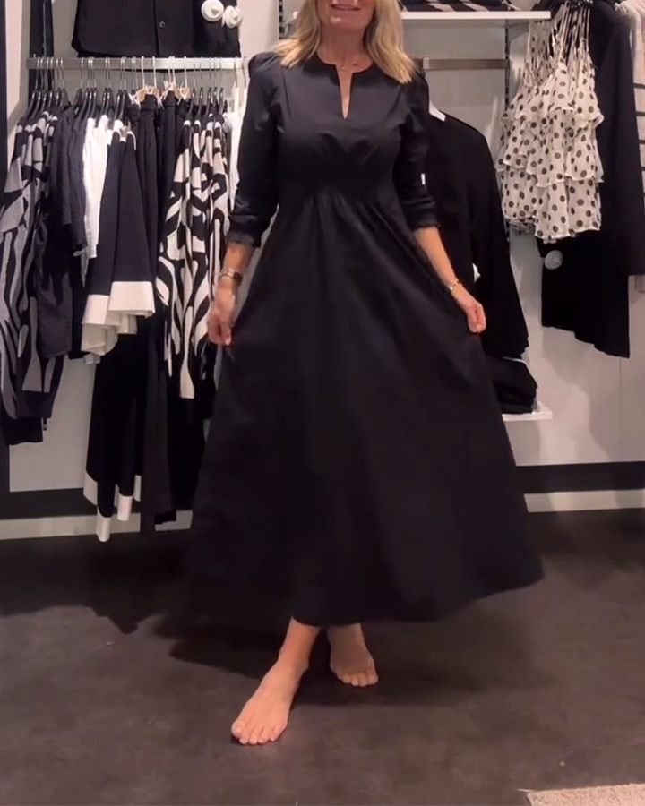 Drune | Linien Kleid mit Puffärmeln und Tailliertem Schnitt