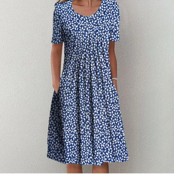 Drune | Kleid A-Linie Passform Knielang mit Kurzen Ärmeln Blumenmuster mit Taschen