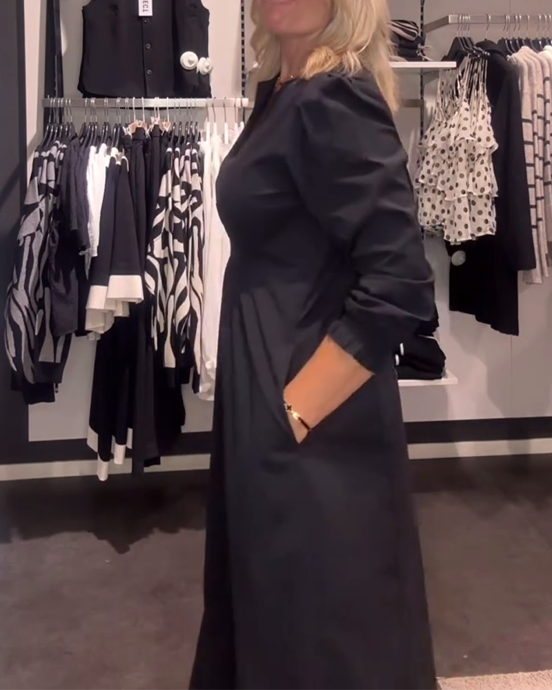 Drune | Linien Kleid mit Puffärmeln und Tailliertem Schnitt