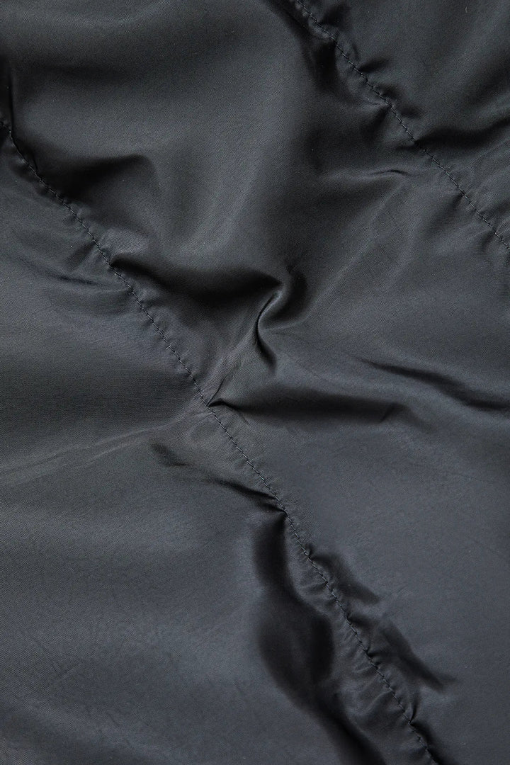 Drune | Schwarze Stehkragen Cut Out Pufferjacke