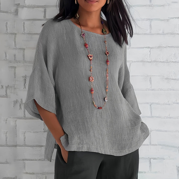 Drune | Rosafarbenes, lockeres Rundhals-Shirt mit 3/4-Ärmeln für Damen