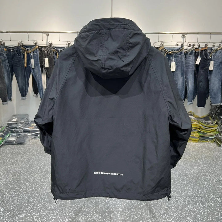 Drune | Leichter Kapuzen Windbreaker mit halbem Reißverschluss und Tasche