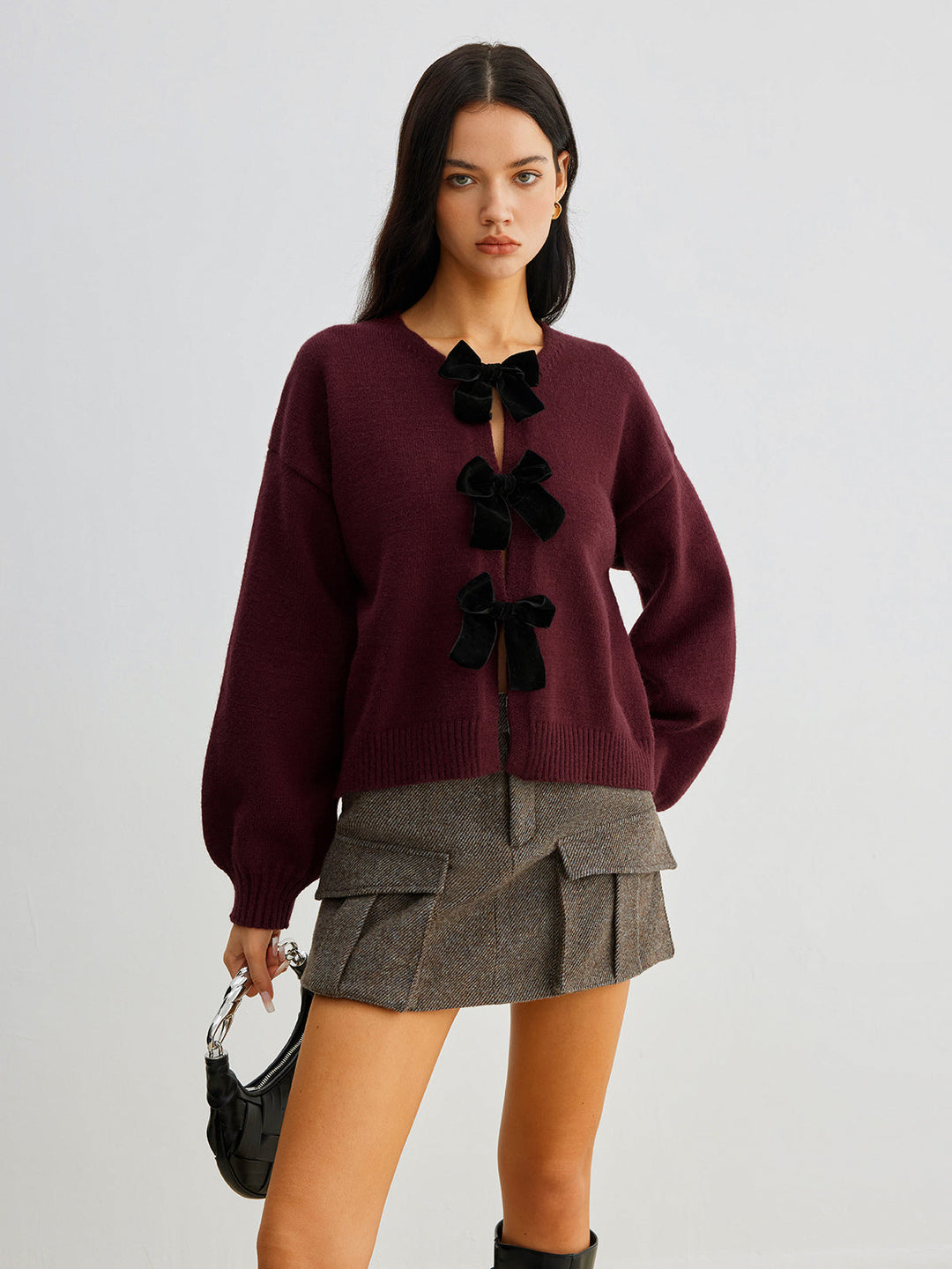 Drune | Strickcardigan mit Samtschleifen Wollmischung Feminin und Modern