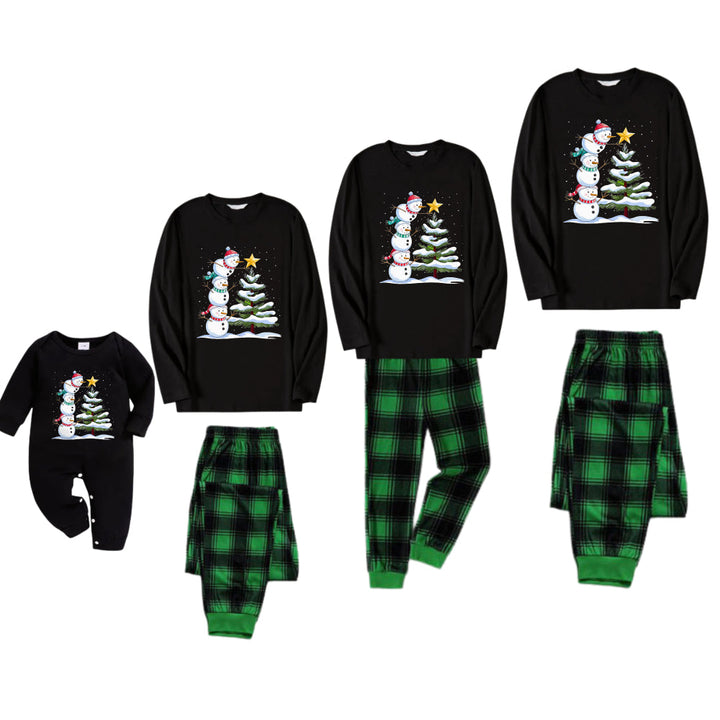 Drune | Weihnachtsfamilien-Pyjama-Set - Schwarzes Oberteil und grüne Karo-Hose mit Schneemann-Comic-Druck
