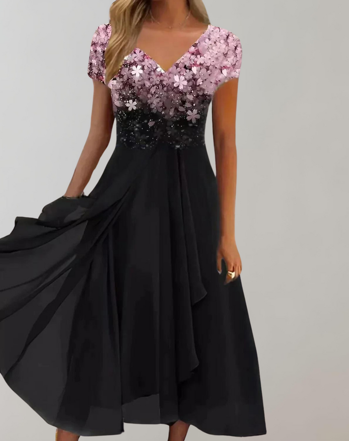 Luméa™ – Elegantes Abendkleid mit Blumen-Glanz & fließendem Rock