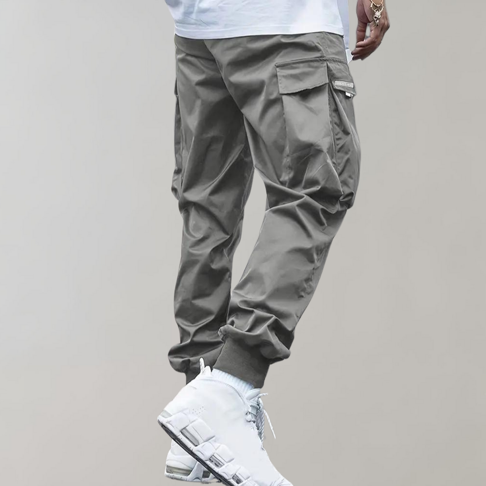 Drune | Lose Sitzende Cargohose mit Verstellbarem Kordelzug und Mehreren Taschen