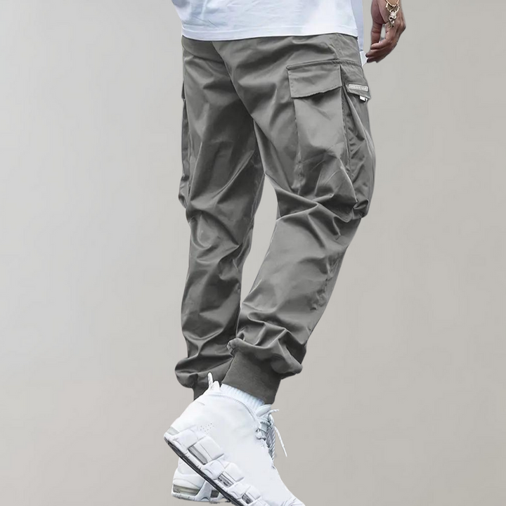 Drune | Lose Sitzende Cargohose mit Verstellbarem Kordelzug und Mehreren Taschen