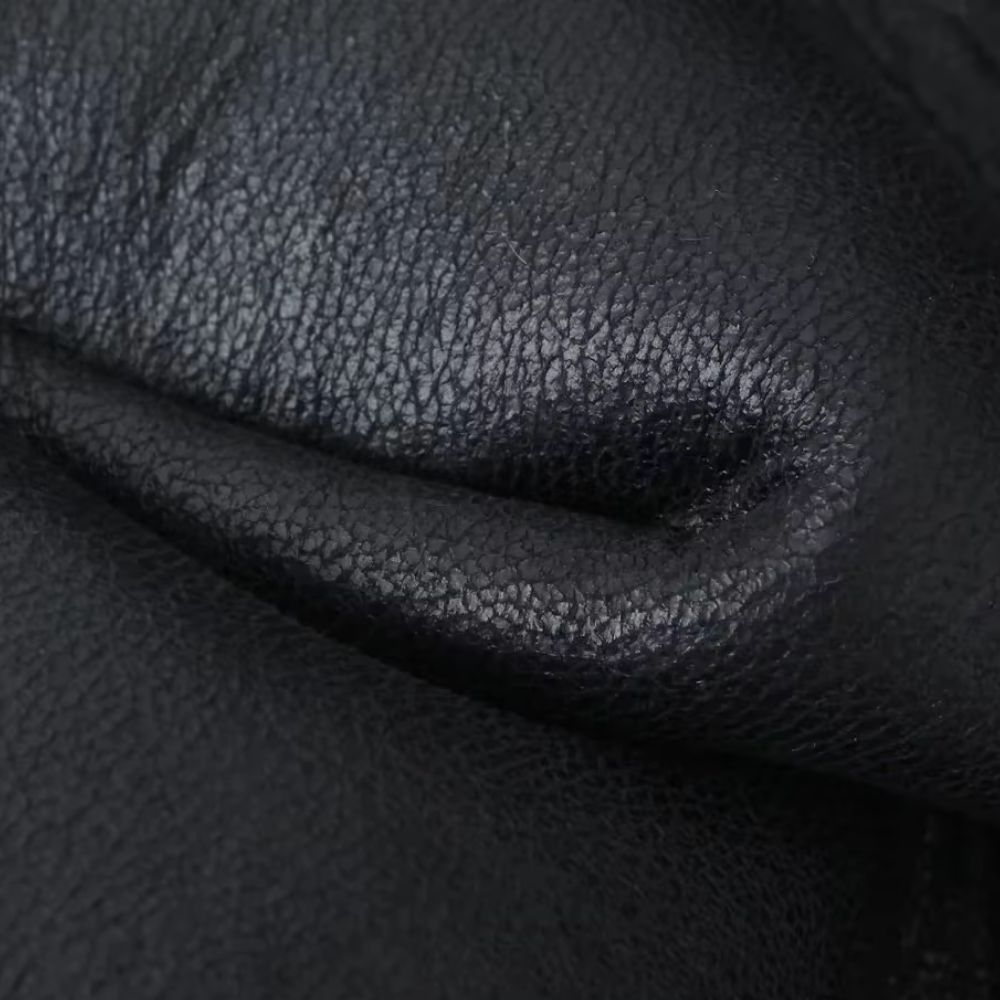 Drune | Weste Damen aus Kunstleder mit Faux Shearling Futter