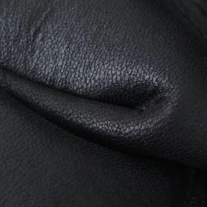 Drune | Weste Damen aus Kunstleder mit Faux Shearling Futter