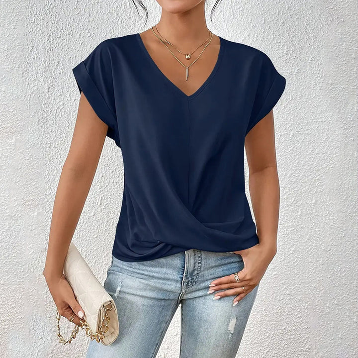 Drune | Elegantes, einfarbiges T-Shirt mit V-Ausschnitt und gedrehtem Saum für Damen