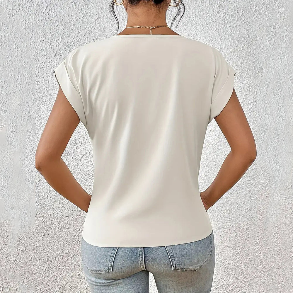 Drune | Elegantes, einfarbiges T-Shirt mit V-Ausschnitt und gedrehtem Saum für Damen
