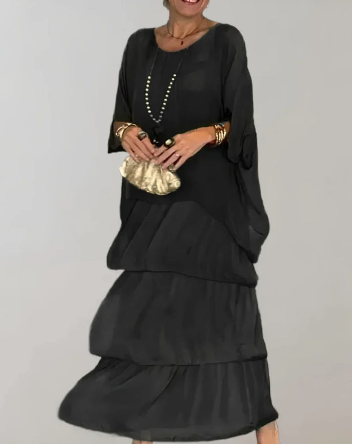 Drune | Elegantes Maxikleid mit Fledermausärmeln und Gestuftem Rundhalsausschnitt