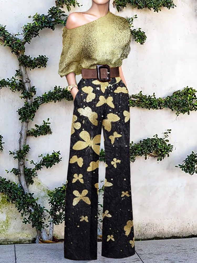 Drune | trägerloser Jumpsuit mit Blumenmuster