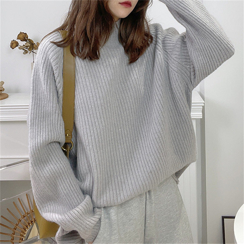 Damen lässiger Grobstrickpullover mit hochgeschlossenem Kragen und asymmetrischem Saum Drune