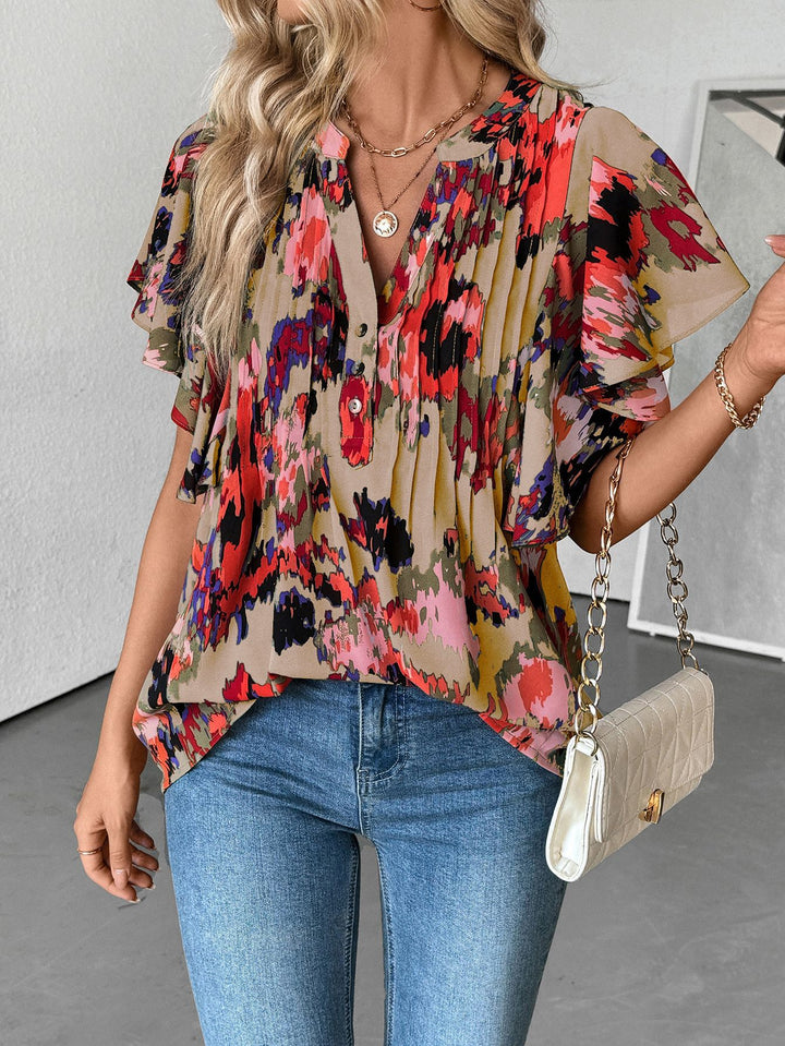 Damen Bluse mit eleganten Rüschendetails und verspieltem Print Drune