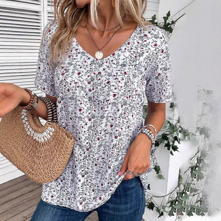 Damen nan lässiges Kurzarm-Tunika-Shirt mit Rundhalsausschnitt, zartem Blumenallover und dekorativen Brustfalten Drune