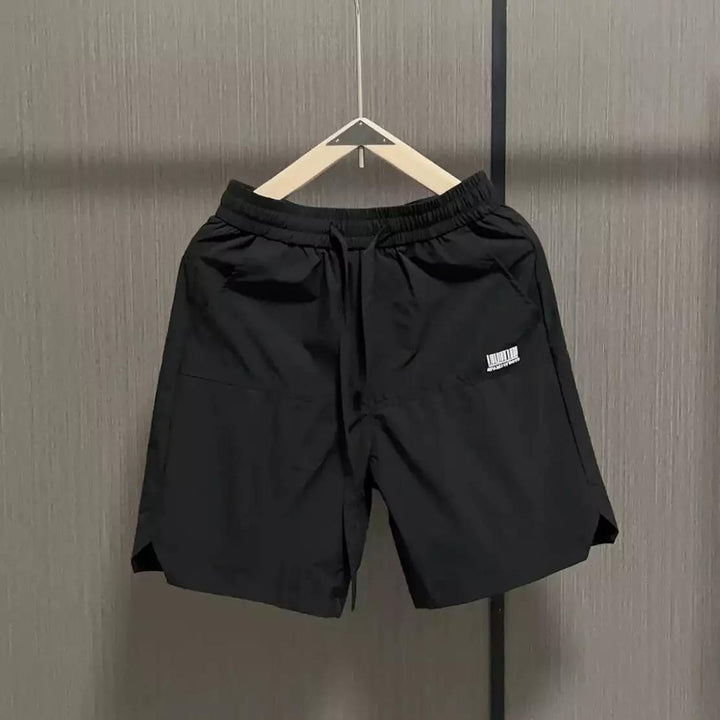 Herren lässige Sportshorts mit elastischem Bund und seitlichen Eingrifftaschen Drune