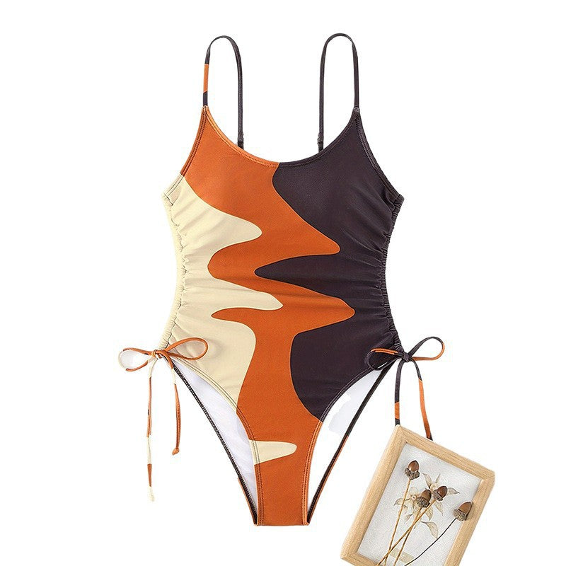 Damen Einteiler Badeanzug mit asymmetrischem Muster und verstellbarem Bindeband Drune