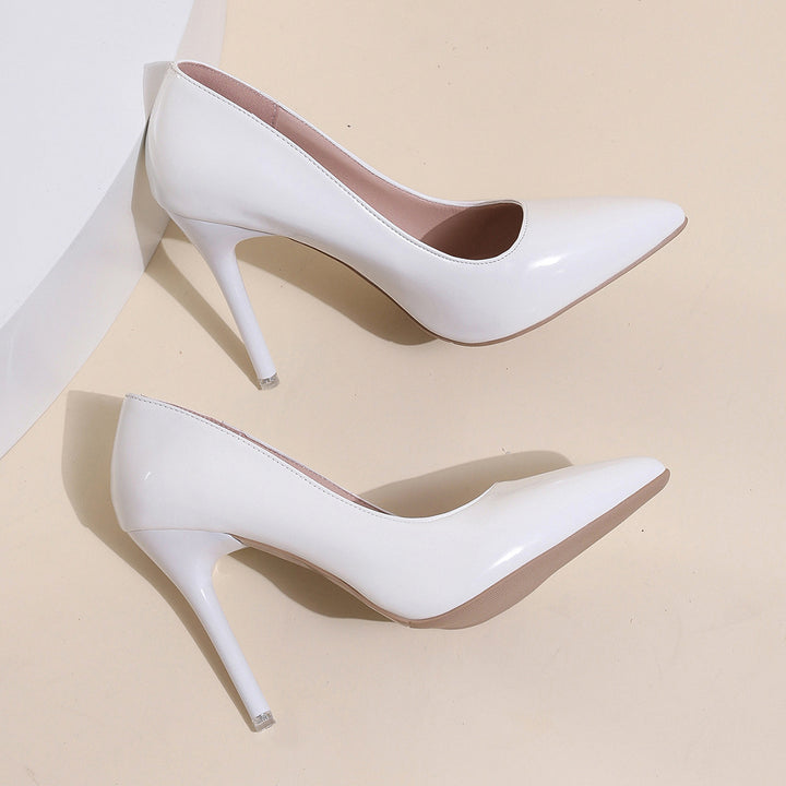 Damen Pumps mit stilvollem Spitzendesign und glänzender Lackoberfläche Drune
