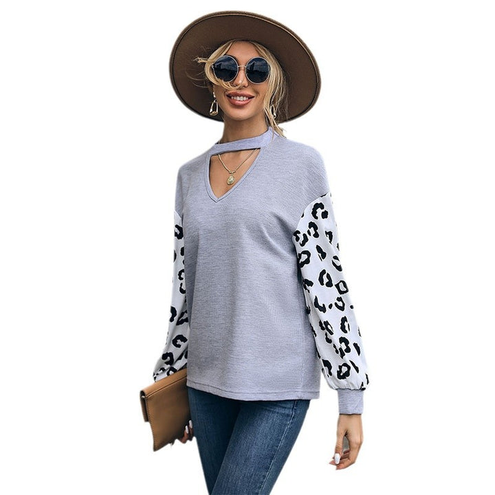 Damen Sweatshirt mit V-Ausschnitt und trendigen Leopardenärmel Drune