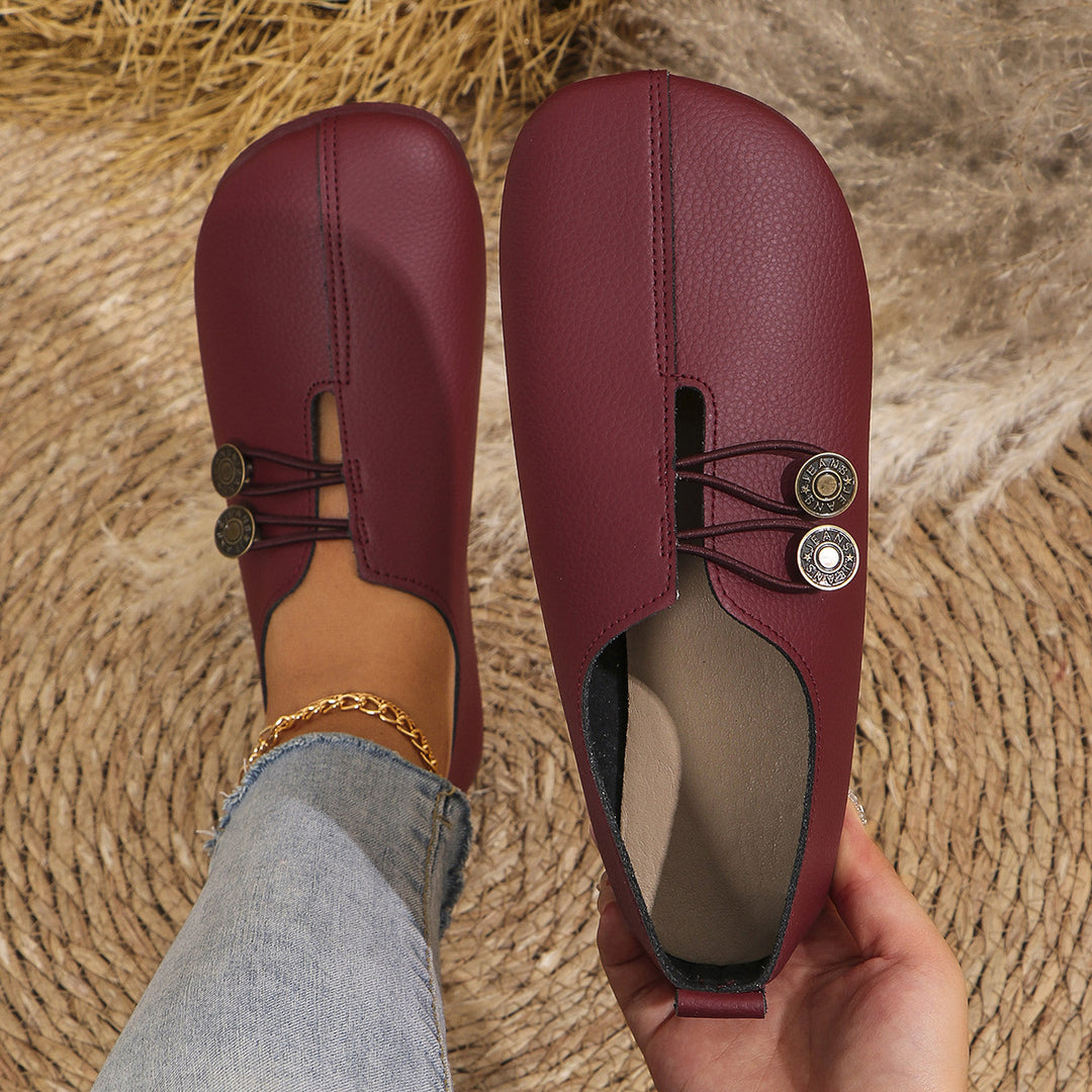 Damen nan flache Komfort-Mule mit dekorativen Knopf-Bändern und weichem Microvelours-Textil Drune