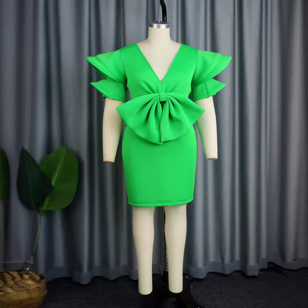 Damen Kleid mit voluminösen Rüschensäumen und dekorativem Schleifenakzent Drune