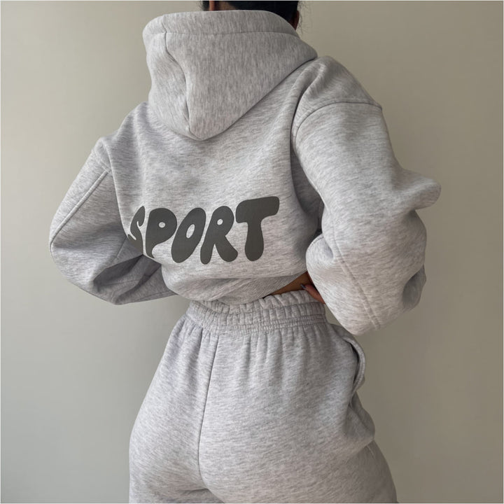 Damen modisches sportliches Set mit cropped Hoodie und weiten Jogginghosen Drune