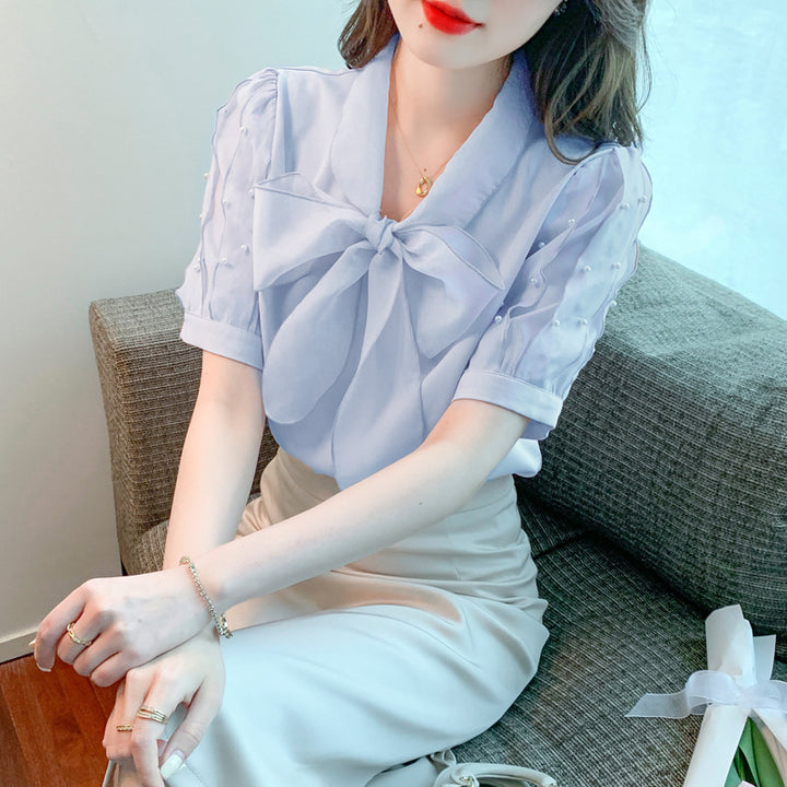 Damen Bluse mit elegantem Schleifen-Ausschnitt und strukturierten Ärmeln Drune