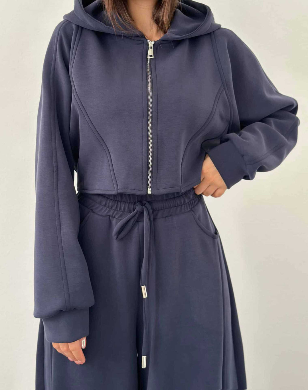 Damen nan weite Highwaist-Loungehose mit Tunnelzug, Eingrifftaschen und Ziernähten Drune