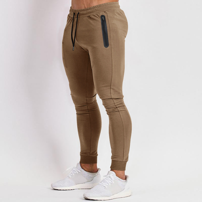 Herren nan schmal geschnittene Funktions-Jogginghose mit wasserdichter Reißverschlusstasche und elastischem Bund Drune