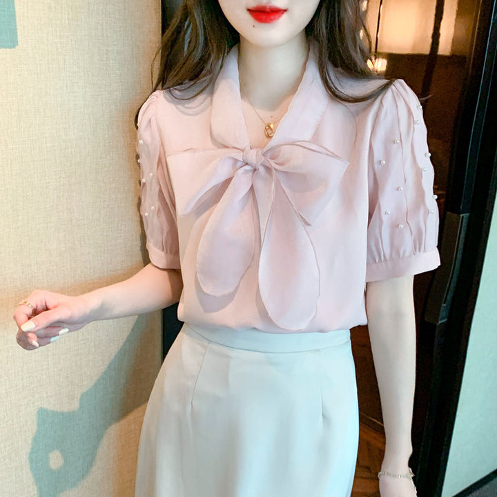 Damen Bluse mit elegantem Schleifen-Ausschnitt und strukturierten Ärmeln Drune