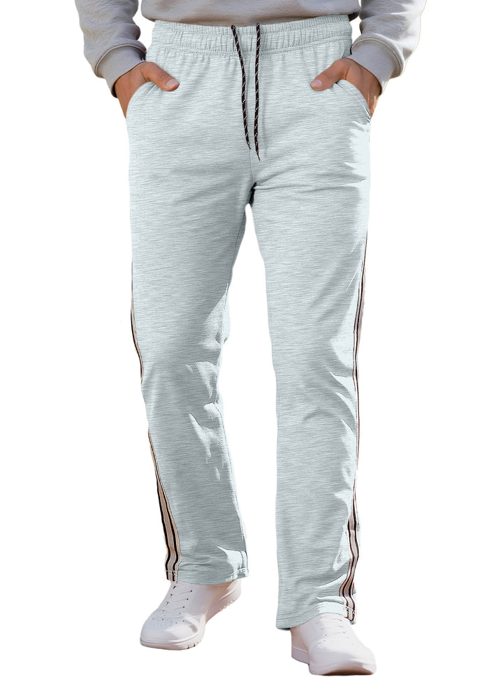 Herren nan Retro-Trackhose mit schmal zulaufendem Bein elastischem Bund Tunnelzug und seitlichen Streifen Drune