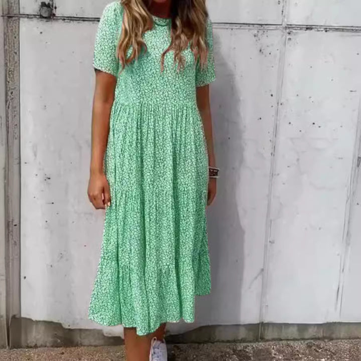 Damen nan geblümtes gekrepptes Midikleid mit geraffter Empire-Taille, kurzen Ärmeln und stufigem Volantrock Drune